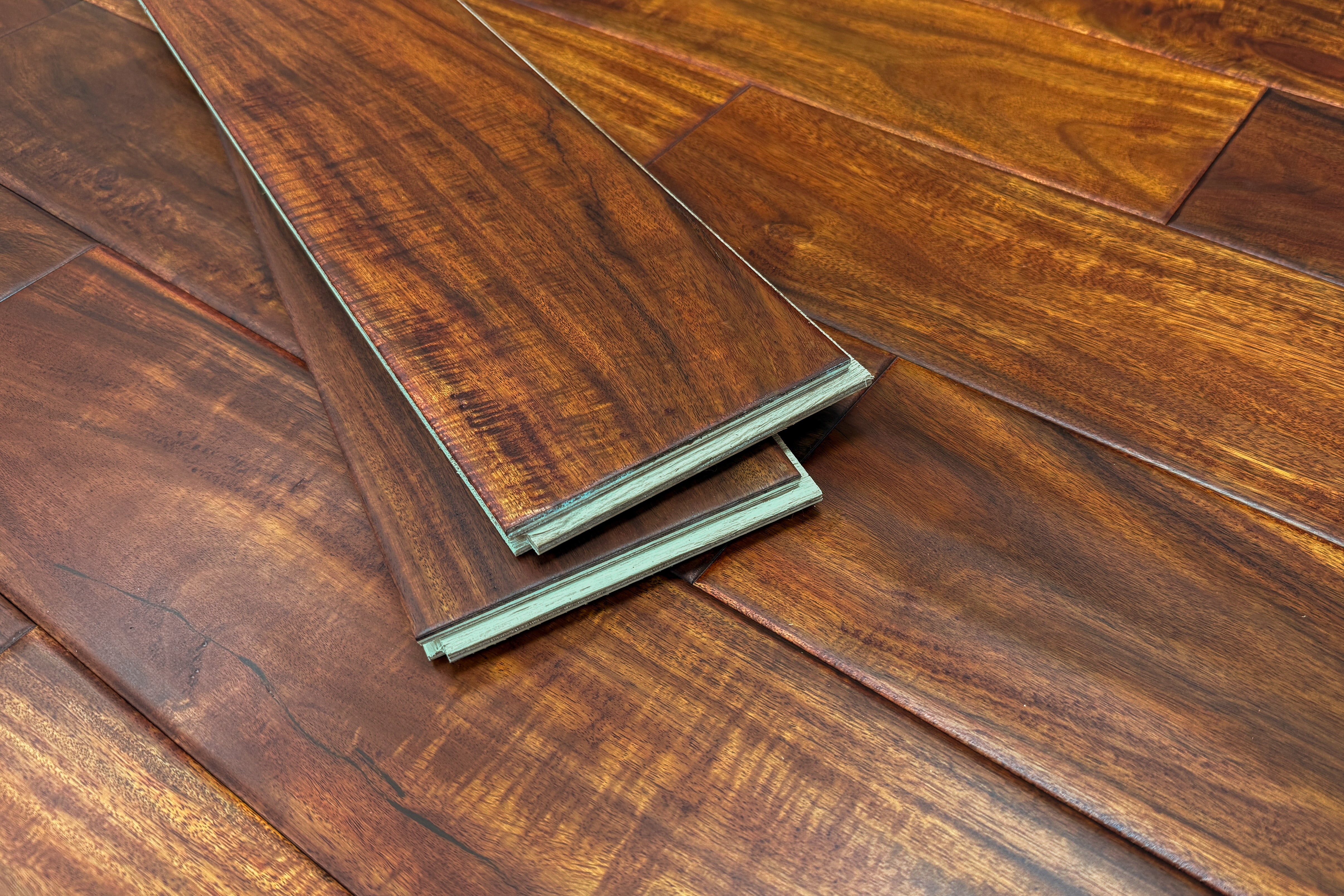 hand scraped tobacco canyon acacia 4 3/4" x 1/2" Prefinished Engineered Hardwood Flooring / 4 3/4" x 1/2" Acacia Hand Scraped Prefinished Engineered Crafted from incredibly durable Acacia wood 4 3/4" x 9/16" Engineered