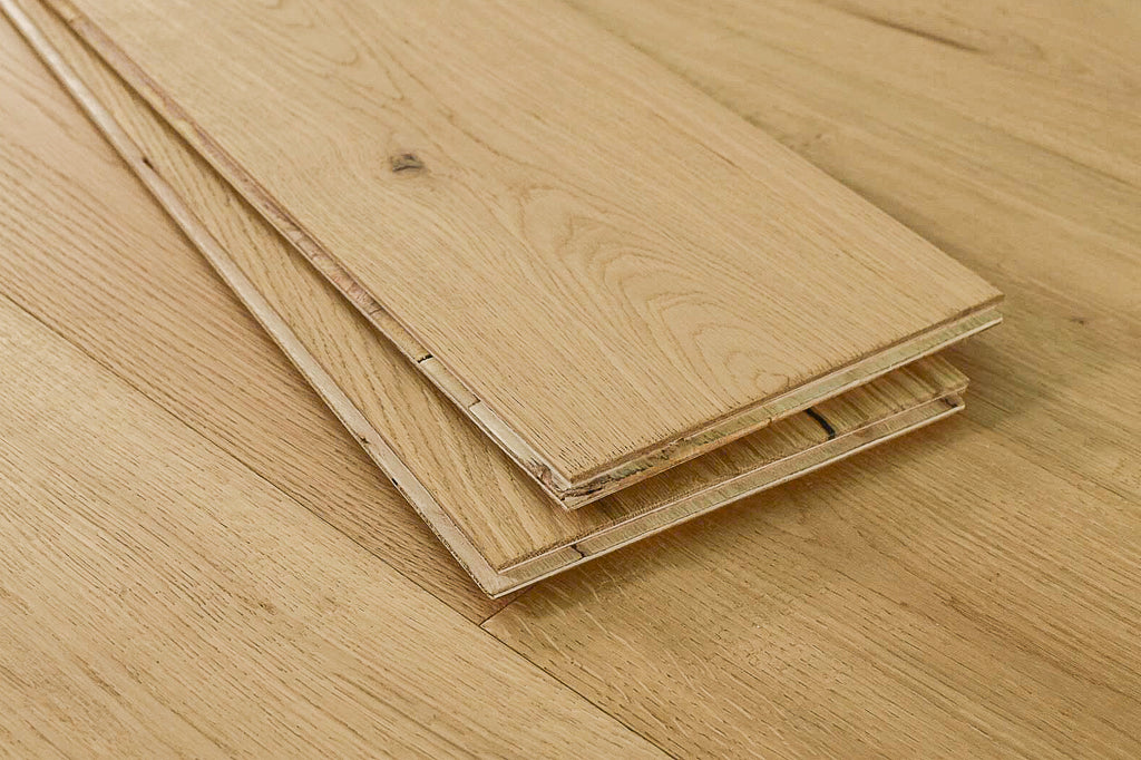 European Oak engineered wood flooring/hardwood/ABCD grade/4 mm top layer/4 mm wear layer/multi-layer core/medium shade/wirebrushed surface/matte finish/beveled edges/glue down installation/nail down installation/concrete subfloor/plywood subfloor/wood acclimation/CARB compliant/Floorscore/EPA/lifetime warranty/brown color/knots/radiant heat compatible/OSMO UV cured oil finish/random length/rustic/4 Sided Tongue & Groove/janka hardness rating/oak/living room floor/dining room floor/basement floor/DYI